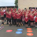 Waltham Primary School pupils celebrate their school's rating of 'good' in the latest Ofsted inspection