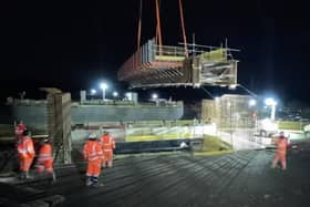 The giant rail bridge for Melton bypass being dropped over the track at Lag Lane