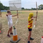 An archery session at a previous children's holiday scheme at Knipton