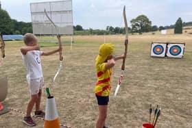 An archery session at a previous children's holiday scheme at Knipton