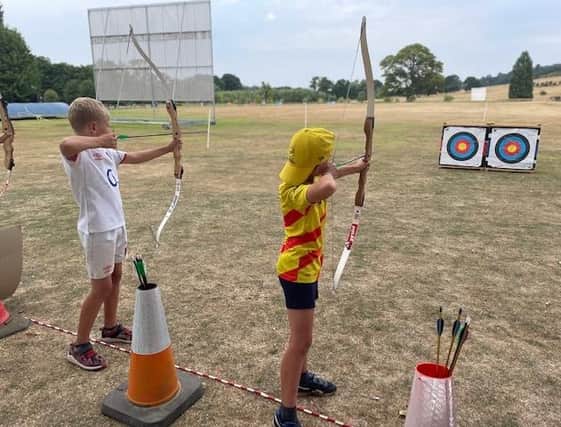 An archery session at a previous children's holiday scheme at Knipton
