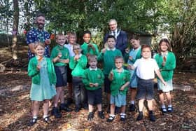 Pupils of Frisby CE Primary School pictured with the Mayor of Melton, Councillor Jim Adcock, after he opened their new pond and wildlife area