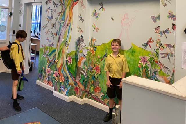Pupils check out the new mural at St Francis Primary School in Melton