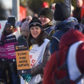 Royal College of Nursing picket line as staff strike outside a hospital.