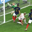 Any body part will do: Kylian Mbappe of France scores the team's second goal past Kasper Schmeichel of Denmark  (Picture: Tim Nwachukwu/Getty Images,)
