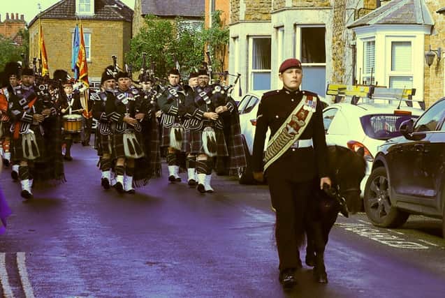 Lt Cpl Richards with Pegasus & Seaforth Highlanders Pipe Band leading the Parade along High St, Somerby, at the weekend IMAGE Melanie Davies