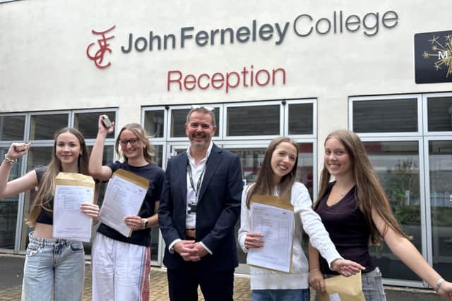 John Ferneley College headteacher Terry Claridge with GCSE students Holly Taylor, Isabella Little, Lilly Mountford-Platts and Isabelle Hawkins