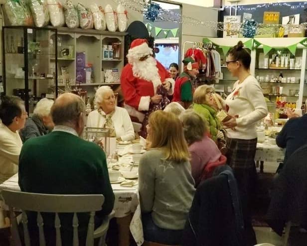 Santa Claus arrives at the Re-engage Christmas party at The Welcome Cafe at Twyford