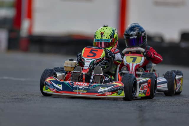 Hudson Sharpe racing his kart