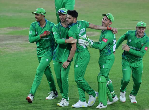 Naveen-ul-Haq of Leicestershire Foxes is mobbed by team mates after taking the wicket of Dane Paterson to win the Vitality T20 Blast match between Nottinghamshire Outlaws and Leicestershire Foxes at Trent Bridge. (Photo by David Rogers/Getty Images)