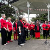 Global Harmony performing a concert at the bandstand in Melton