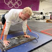 Max Parker demonstrates his new invention.