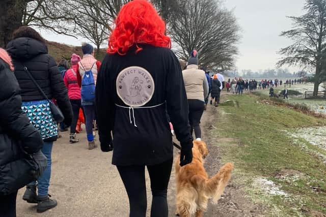 Local business owner Danielle of Pawfect walks with Danielle