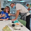 Erin decorates some cakes for her mum at Rainbows Hospice, which is preparing for its Open Day