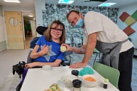 Erin decorates some cakes for her mum at Rainbows Hospice, which is preparing for its Open Day