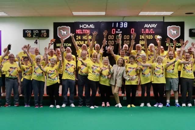 Bowlers with TV news presenter Anne Davies at the start of the Bowlathon at Melton Indoor Bowls Club