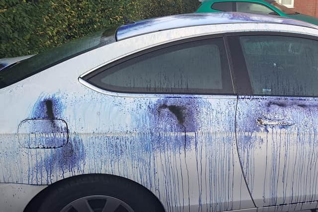 The car in Garden Lane, Melton, which was attacked with blue ink, paint or powder by vandals