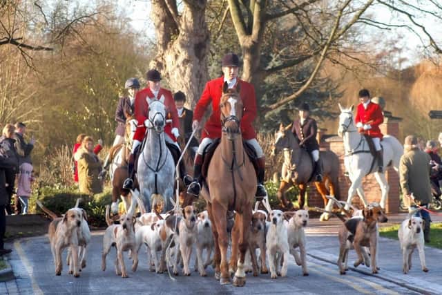 Riders and hounds leave the Play Close Park during the 2017 Melton New Year hunt meet