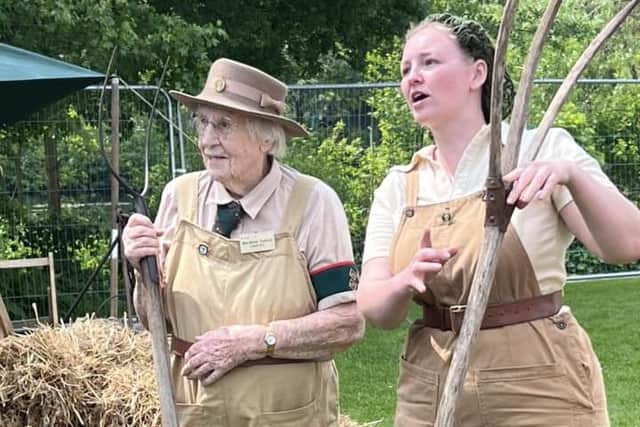 Real life Land Army girl Annie Duplok (101) works with the re-enactment team at the Melton 1940s event