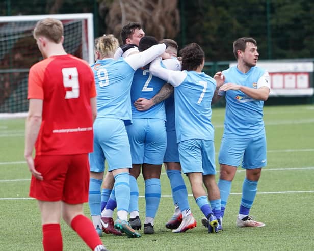 Melton celebrate their late equaliser. Photo: Mark Woolterton.