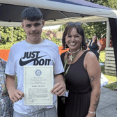Rotary club member, Maggie Wilson, presents The Tony Field Award to Lesta Brown, watched by Melton Learning Hub operations manager, Lucie Larke