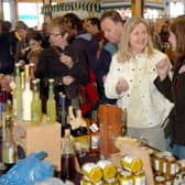Shoppers check out one of the stalls at a previous foodie event at the livestock market site in Melton