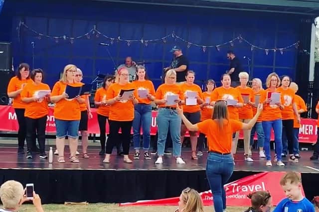 Ruby Jade Procinski conducts one of her community choirs in Leicestershire - a new Melton one launches on Friday