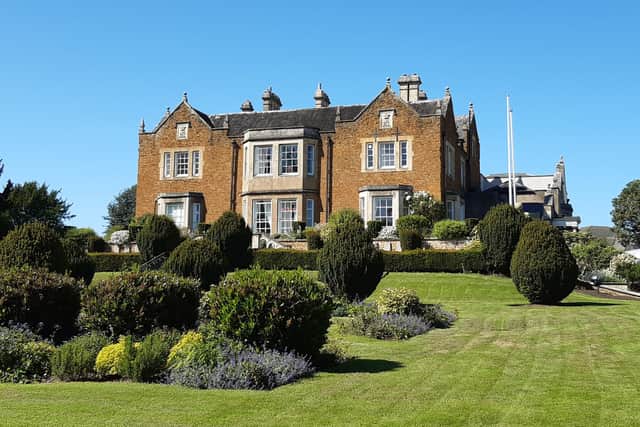 Historic Egerton Lodge nursing home in Melton Mowbray viewed from Memorial Gardens