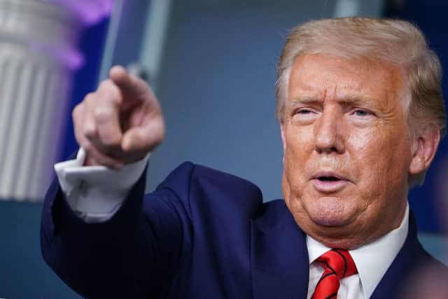 President Donald Trump appeared to defend the accused Kenosha shooter (Getty Images)