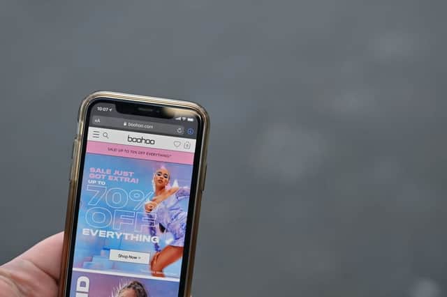 Boohoo launches investigation after same clothing sold for different prices across brands (Photo by PAUL ELLIS/AFP via Getty Images)