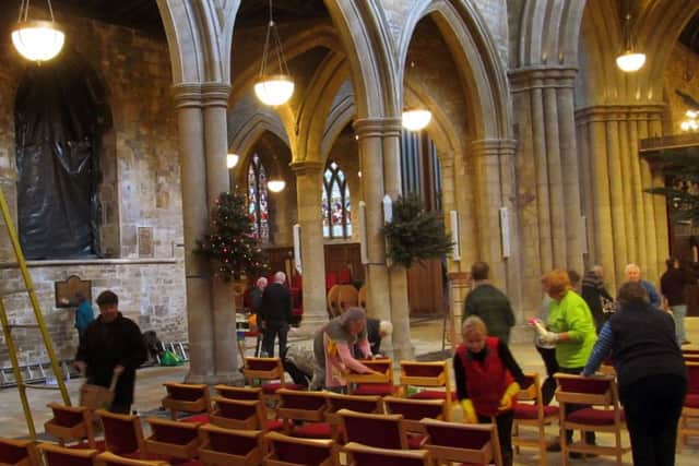Preparations begin for the annual Christmas Tree Festival inside the newly-refurbished St Mary's Church in Melton EMN-171127-151055001