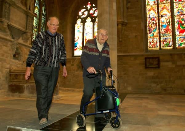 Harold Veazey (99), who has been attending services since 1940, looks around the newly-refurbished St Mary's Church in Melton with project co-ordinator Ian Neale EMN-171127-151107001