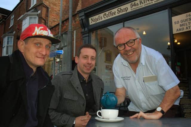 Michael Peaks (left), with Shane Sharkey (centre) and cafe owner Nigel Keep, two of the people who have helped Michael get back on his feet after years of sleeping rough EMN-171129-161054001