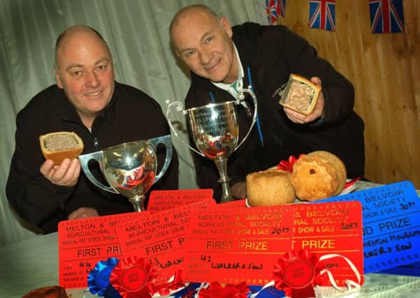 Walkers' master pie makers Guy Coombs and Ian Heircock with their haul of cups and rosettes EMN-170512-165810001