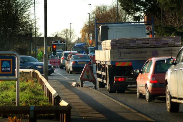 Traffic backs up on Leicester Road as roadworks continue on Friday afternoon EMN-170112-153913001