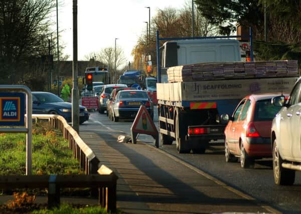 Traffic backs up on Leicester Road as roadworks continue on Friday afternoon EMN-170112-153913001