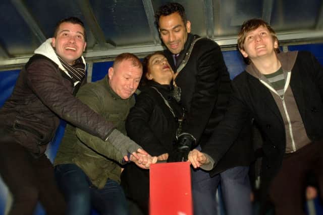 Melton Mayor, Councillor Tejpal Bains and Mayoress, Raj Bains, take the plunge with this year's town panto cast EMN-170412-105832001