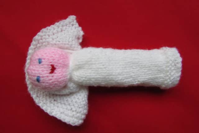 A knitted angel made by the churchs Knit and Chat group PHOTO: Supplied