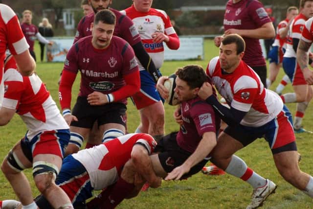 Wellingborough were forced on the defensive as Melton racked up a try bonus point before half-time EMN-171212-083240002