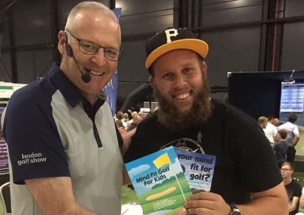 Tony is pictured with Andrew Beef Johnston after interviewing the popular player at a golf show EMN-171213-130859002