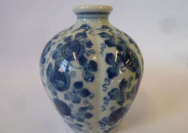 A Chinese porcelain vase which made a record Â£40,000 at auction at Shoulers, Melton EMN-171218-153443001