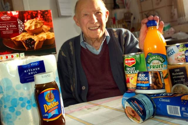 Harry Higgins (91), who had Â£200 taken in a distraction burglary at his Melton home, with some of the items residents have donated to him EMN-171218-163043001