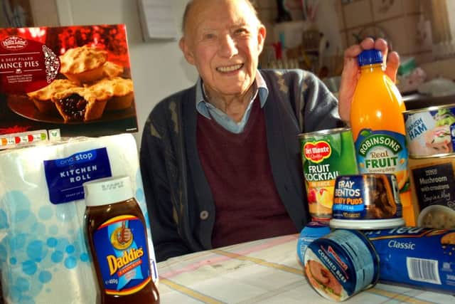 Harry Higgins (91), who had Â£200 taken in a distraction burglary at his Melton home, with some of the items residents have donated to him EMN-171218-163043001