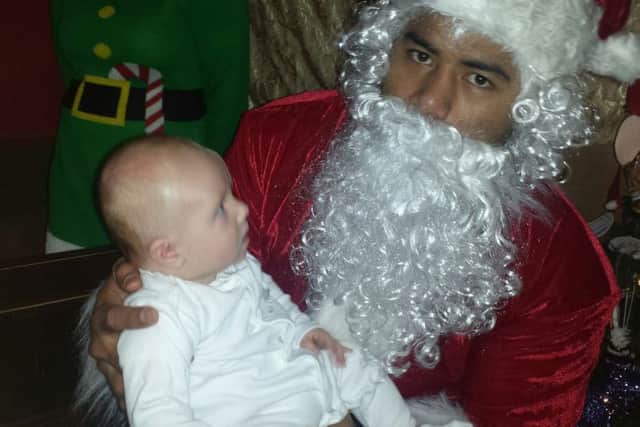 England and Leicester Tigers rugby star Manu Tuilagi suprises junior Melton rugby players by being Santa Claus at their Christmas party EMN-171219-164510001