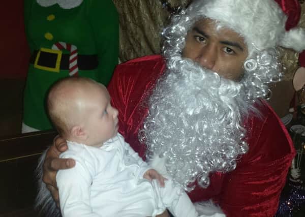 England and Leicester Tigers rugby star Manu Tuilagi suprises junior Melton rugby players by being Santa Claus at their Christmas party EMN-171219-164510001