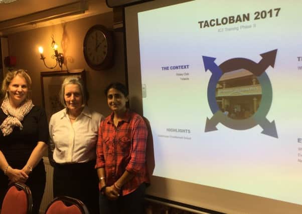 Teachers' Kully and Valerie update Melton Rotarian Alison Blythe about their trip to Sagkahan School in the Philippines PHOTO: Supplied