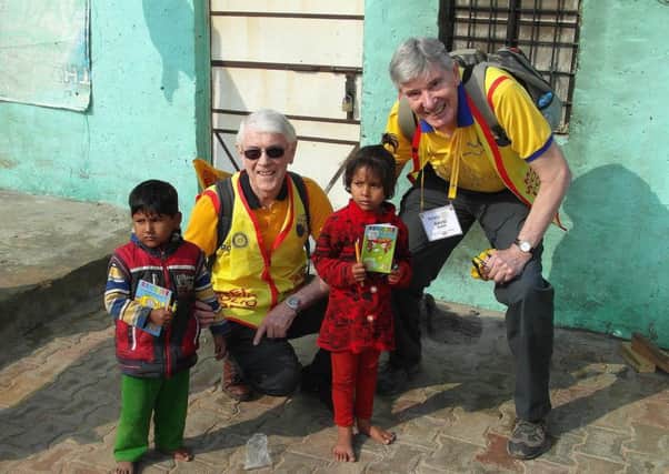 Eric Hall and David Ward with immunised children in Bhiwadi PHOTO: Supplied