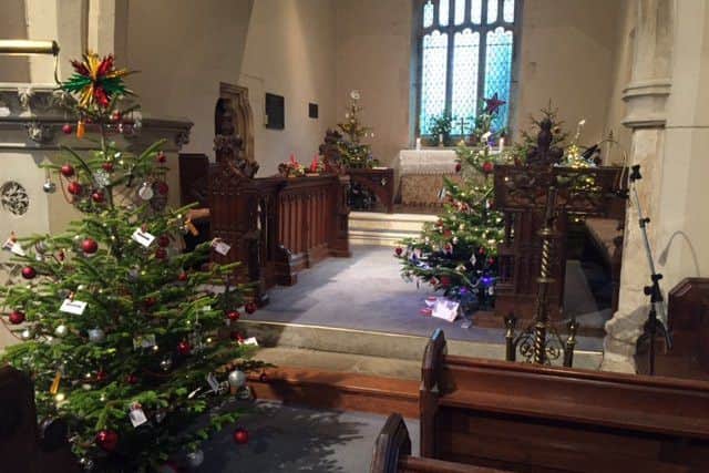 The tree-mendously decorated St Helens Church in Plungar PHOTO: Supplied