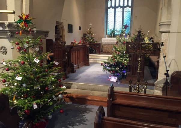 The tree-mendously decorated St Helens Church in Plungar PHOTO: Supplied