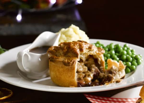 The unusual Christmas dish - Christmas dinner in a pie - served up at Melton pub The Welby EMN-171221-165808001